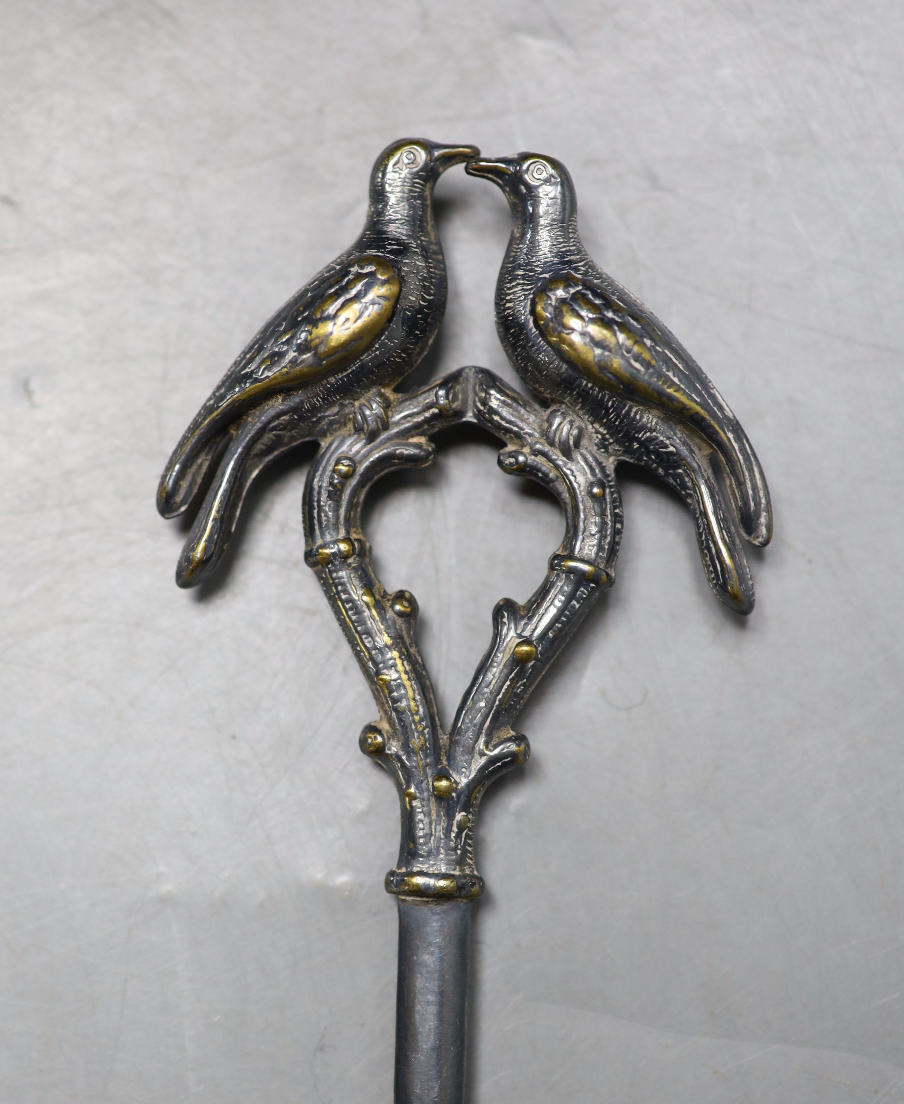 A 19th century French silver plated game skewer by Sabatier, with twin bird terminal, 27cm.